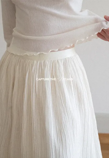 Pleated Flowing Midi Skirt