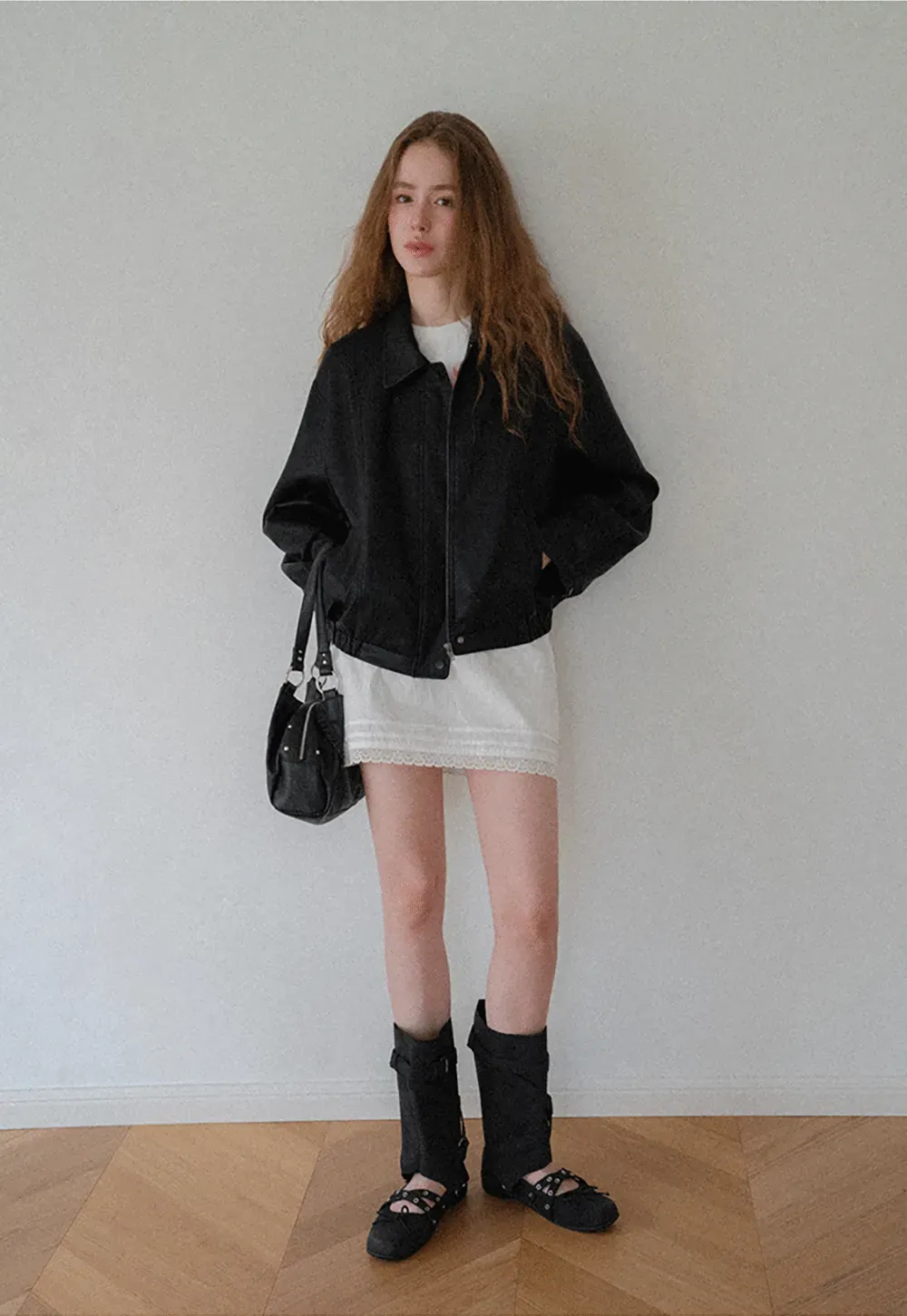 Cropped Leather Jacket with Snap Closure