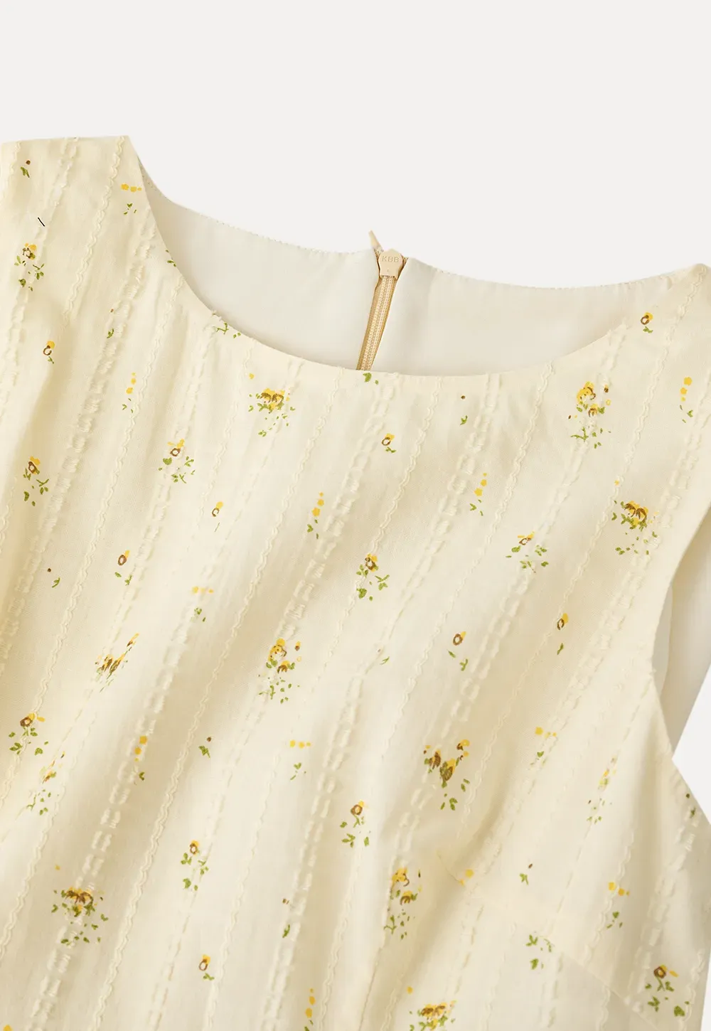 Sleeveless floral dress with layered skirt