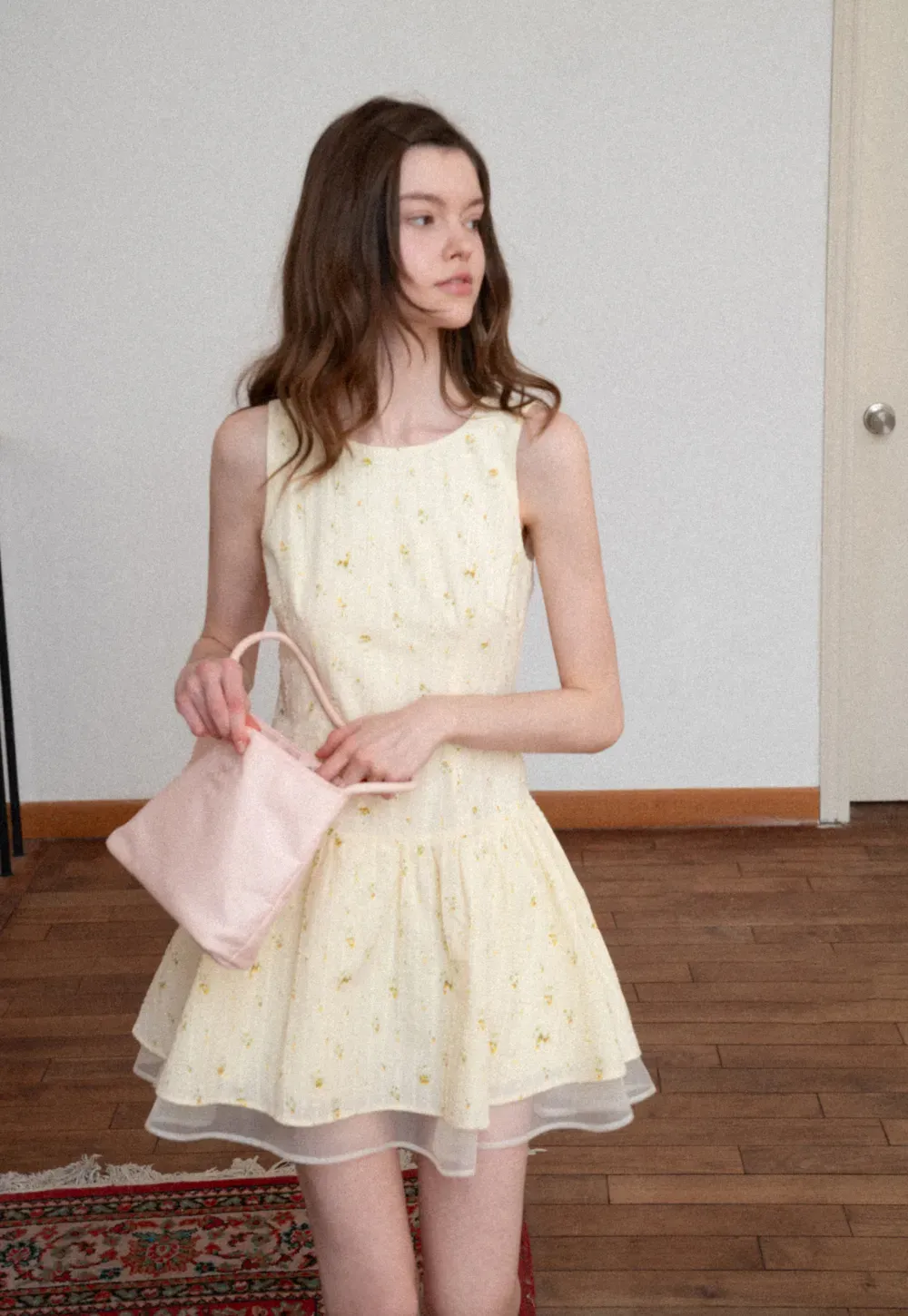 Sleeveless floral dress with layered skirt