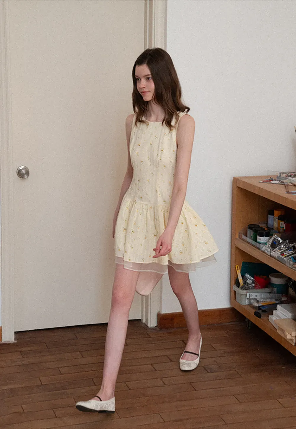 Sleeveless floral dress with layered skirt