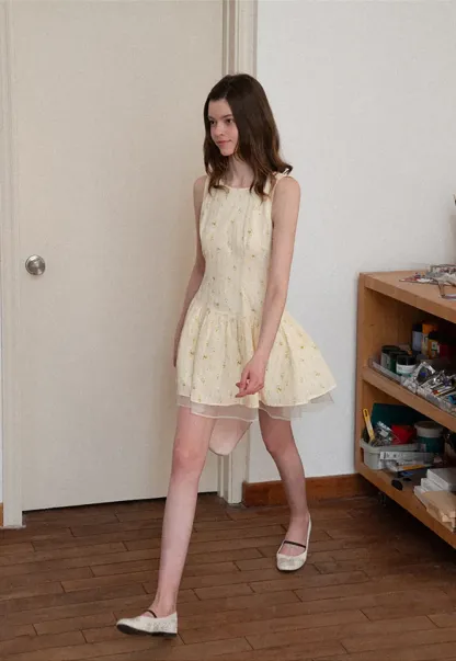 Sleeveless floral dress with layered skirt