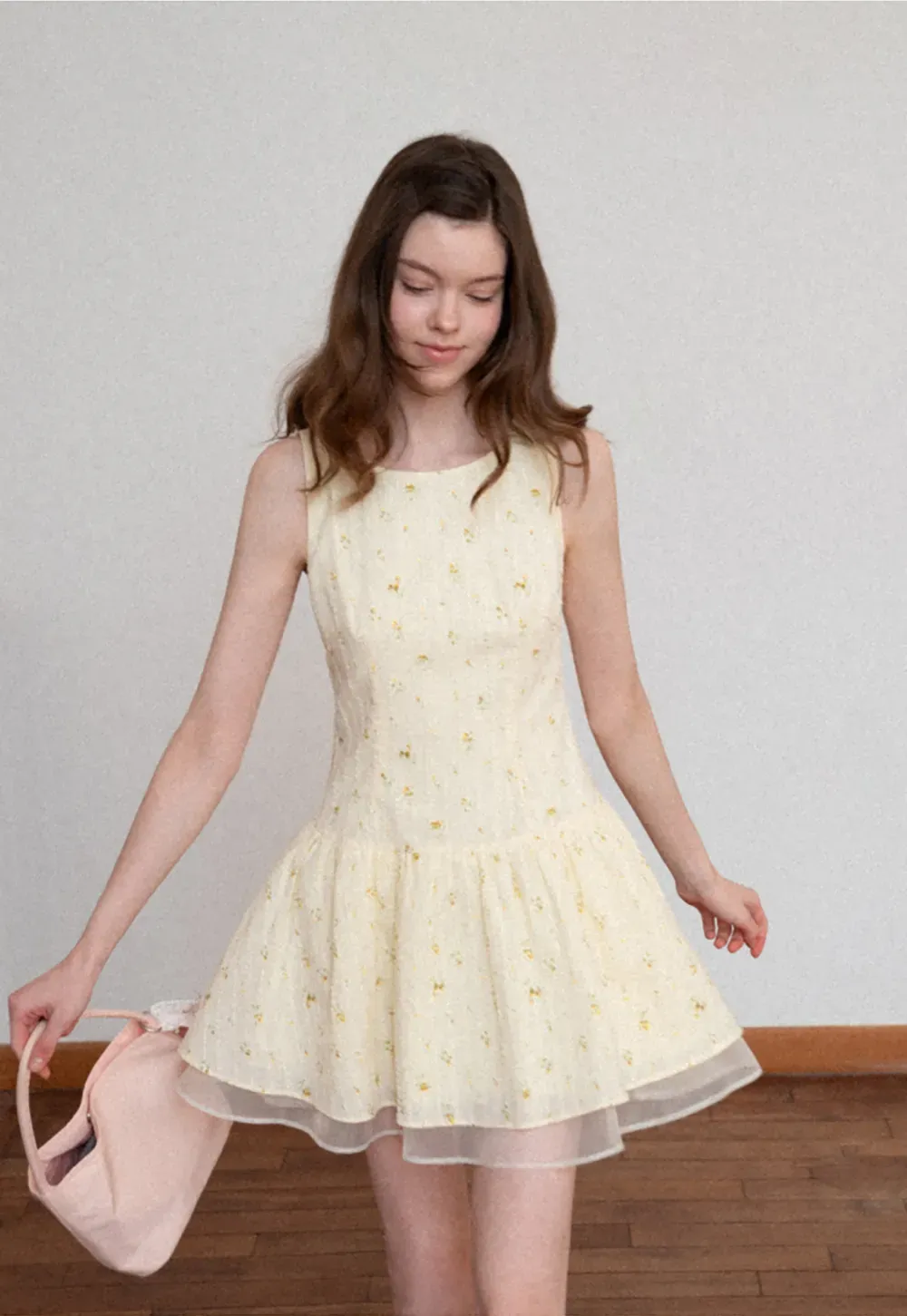 Sleeveless floral dress with layered skirt