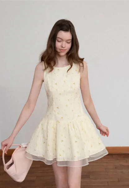 Sleeveless floral dress with layered skirt