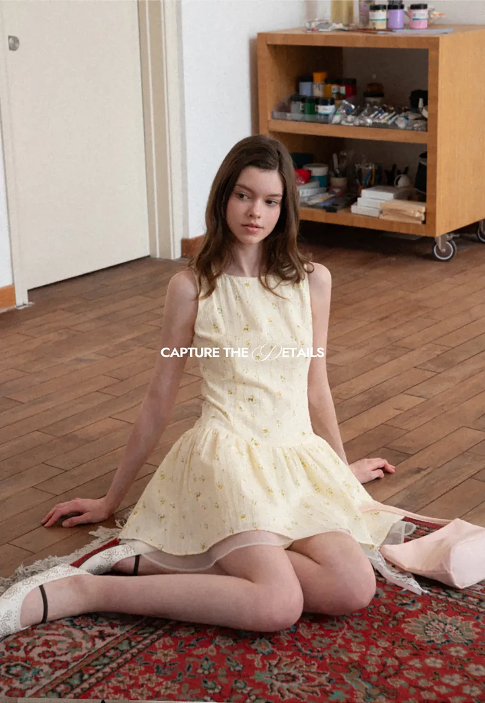 Sleeveless floral dress with layered skirt