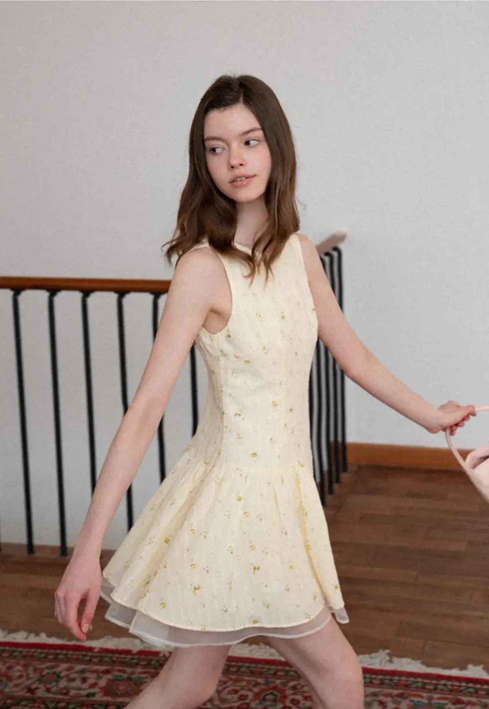 Sleeveless floral dress with layered skirt