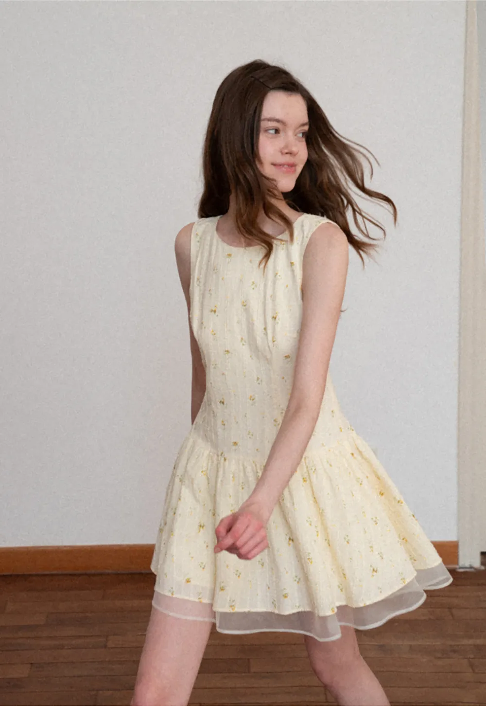 Sleeveless floral dress with layered skirt