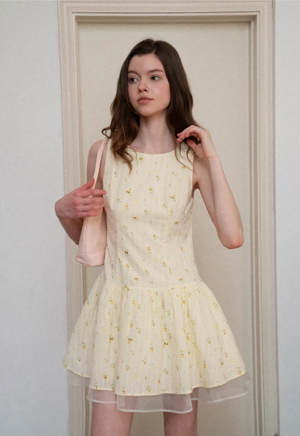 Sleeveless floral dress with layered skirt