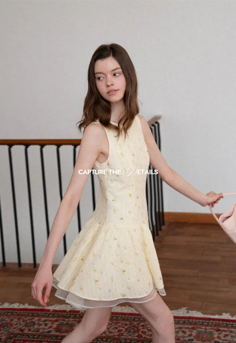 Sleeveless floral dress with layered skirt