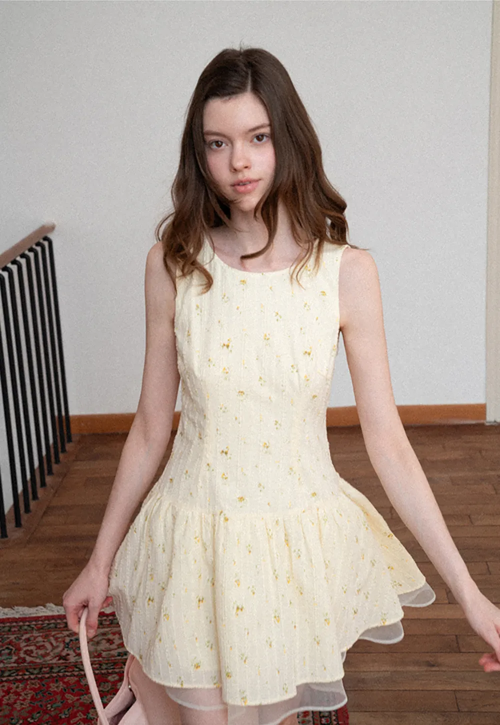 Sleeveless floral dress with layered skirt