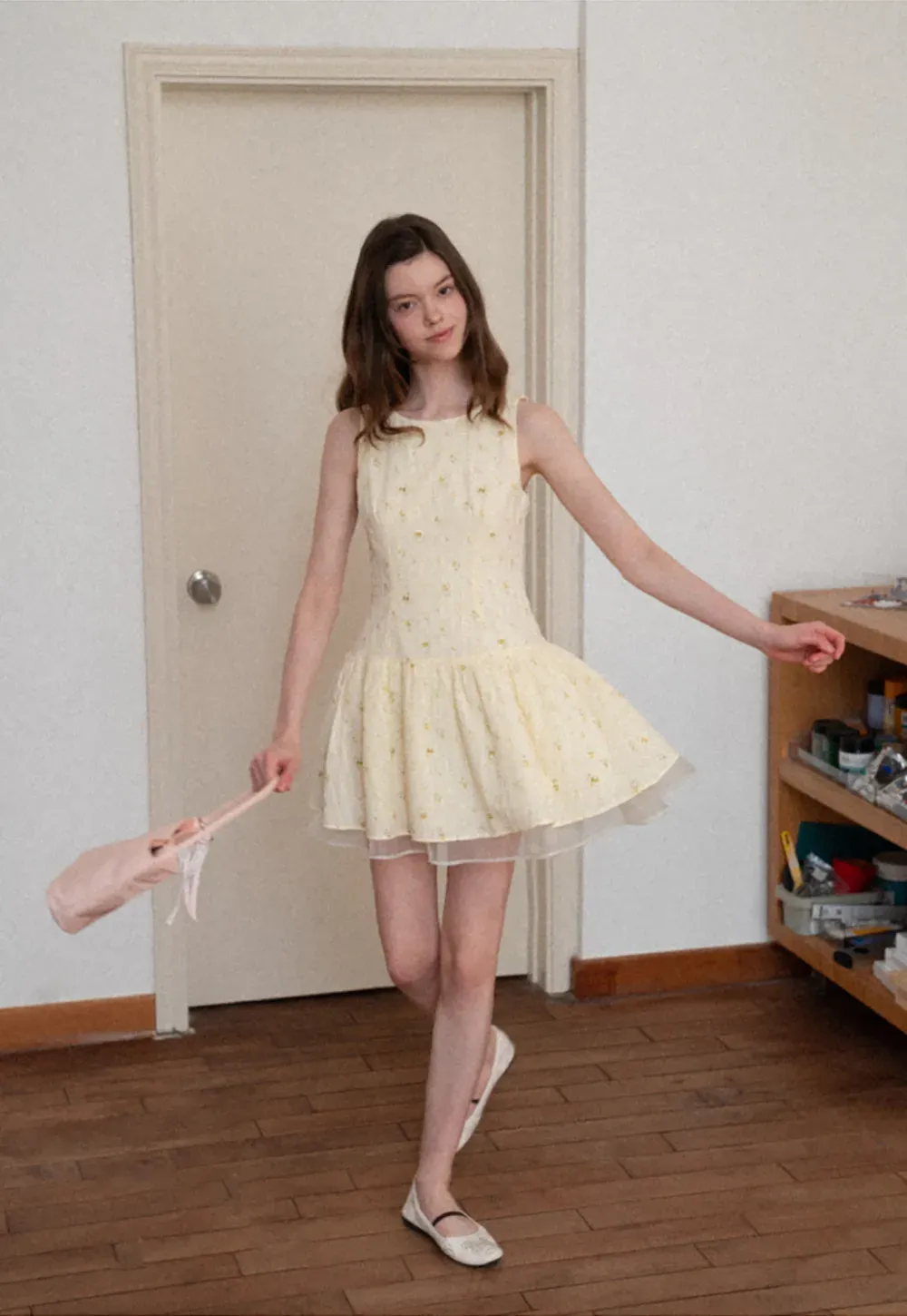 Sleeveless floral dress with layered skirt