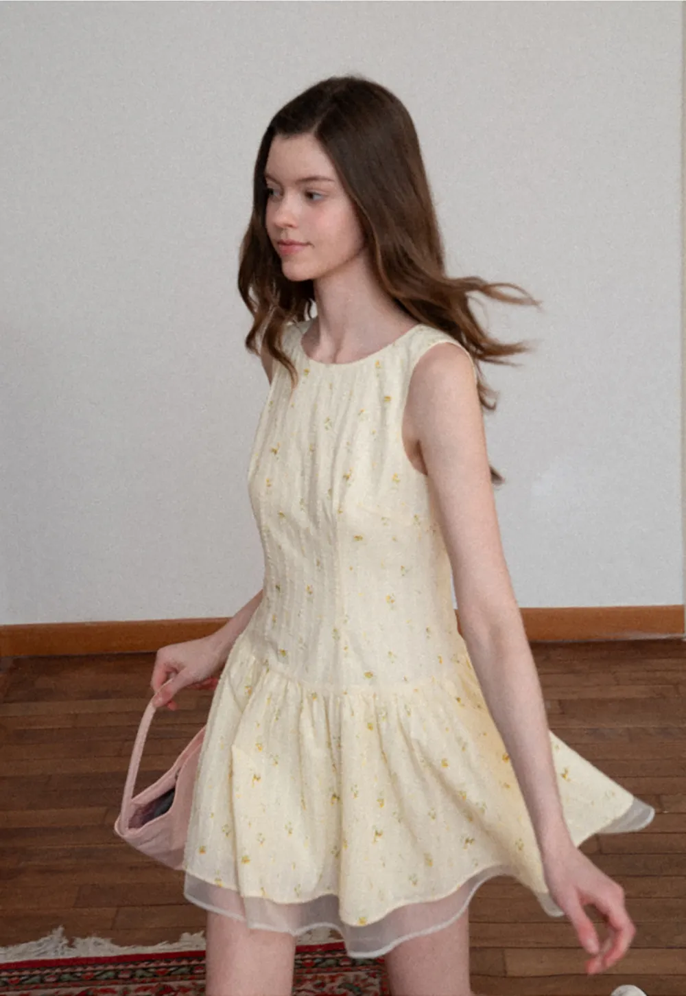 Sleeveless floral dress with layered skirt