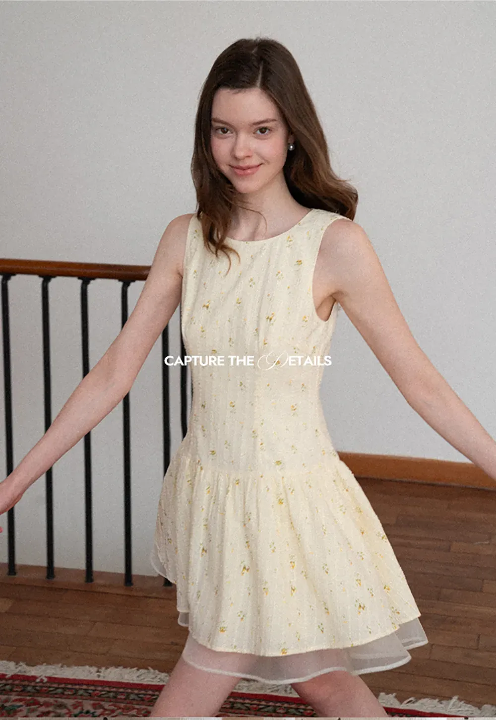 Sleeveless floral dress with layered skirt