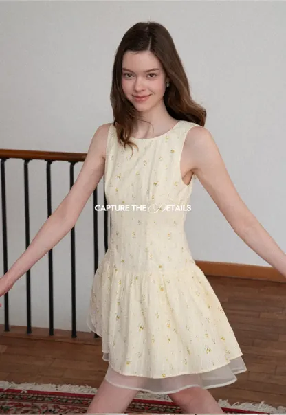 Sleeveless floral dress with layered skirt