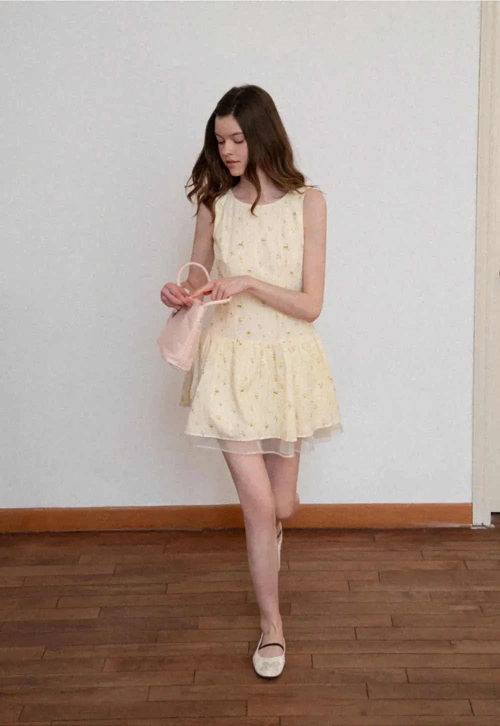 Sleeveless floral dress with layered skirt