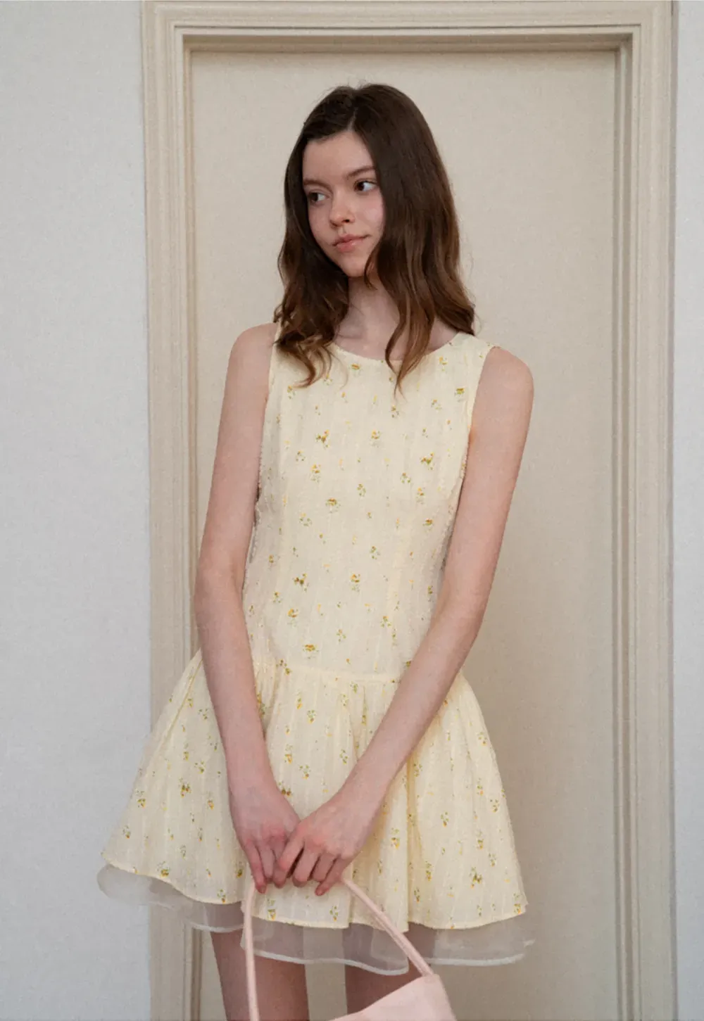 Sleeveless floral dress with layered skirt