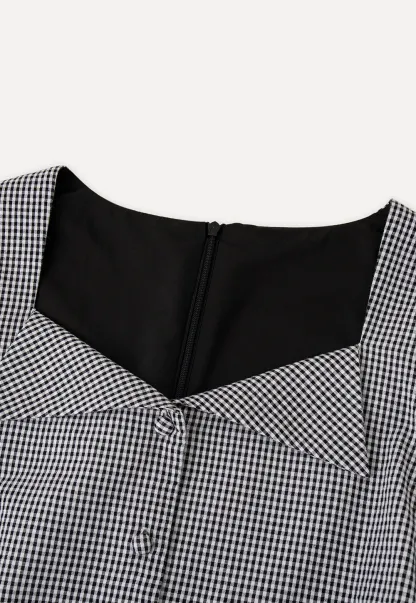 Gingham dress with lace trim and button front