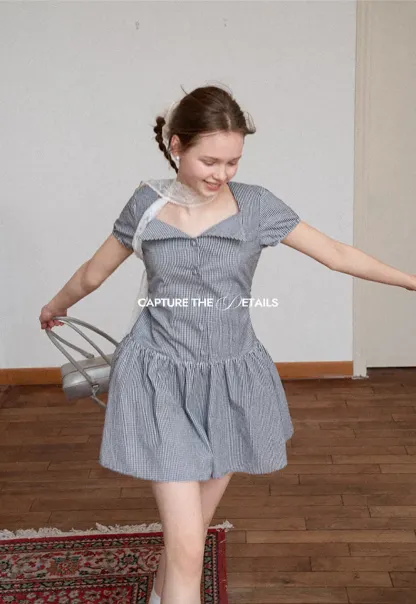 Gingham dress with lace trim and button front