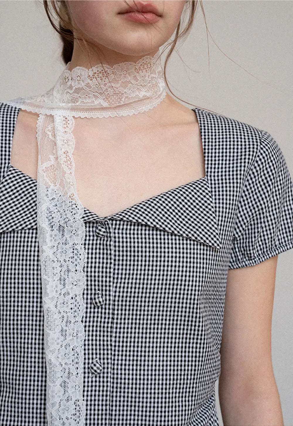 Gingham dress with lace trim and button front