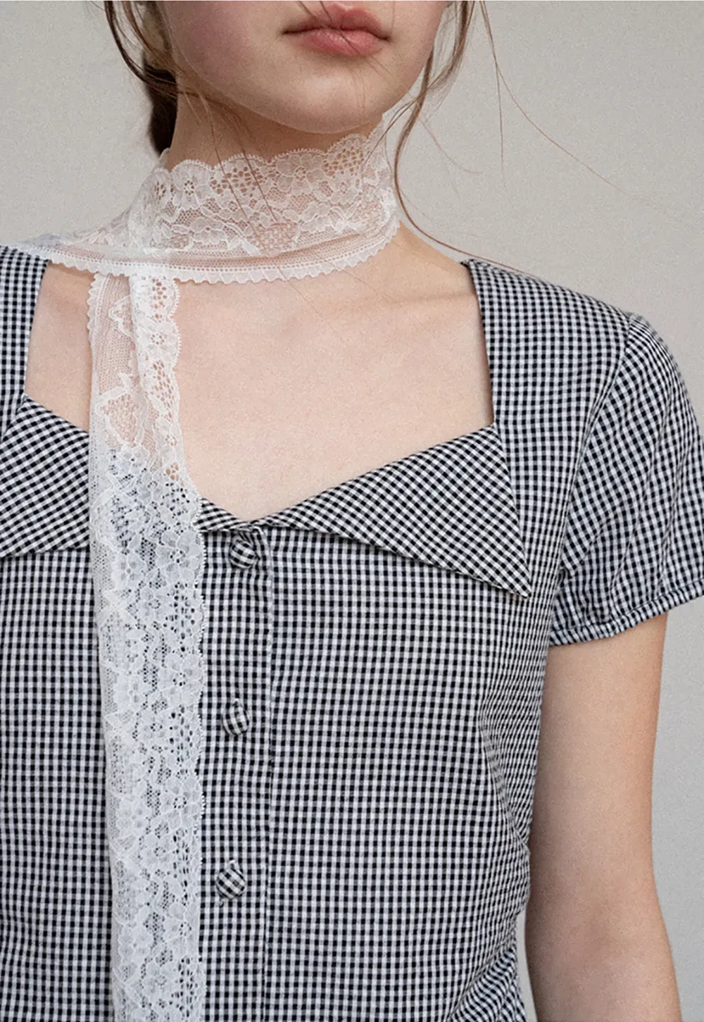 Gingham dress with lace trim and button front