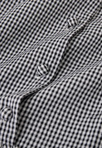 Gingham dress with lace trim and button front