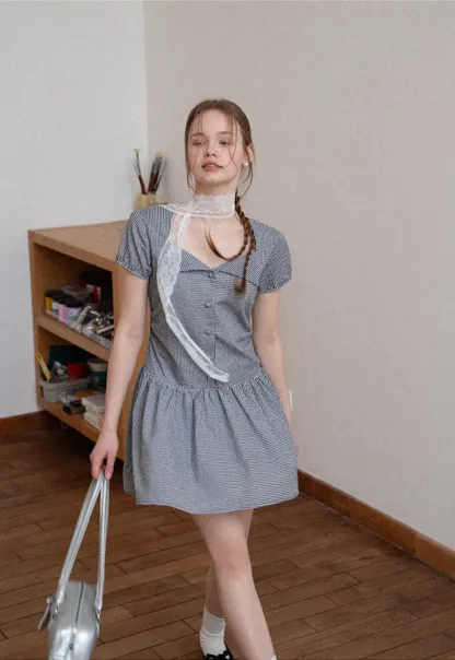 Gingham dress with lace trim and button front