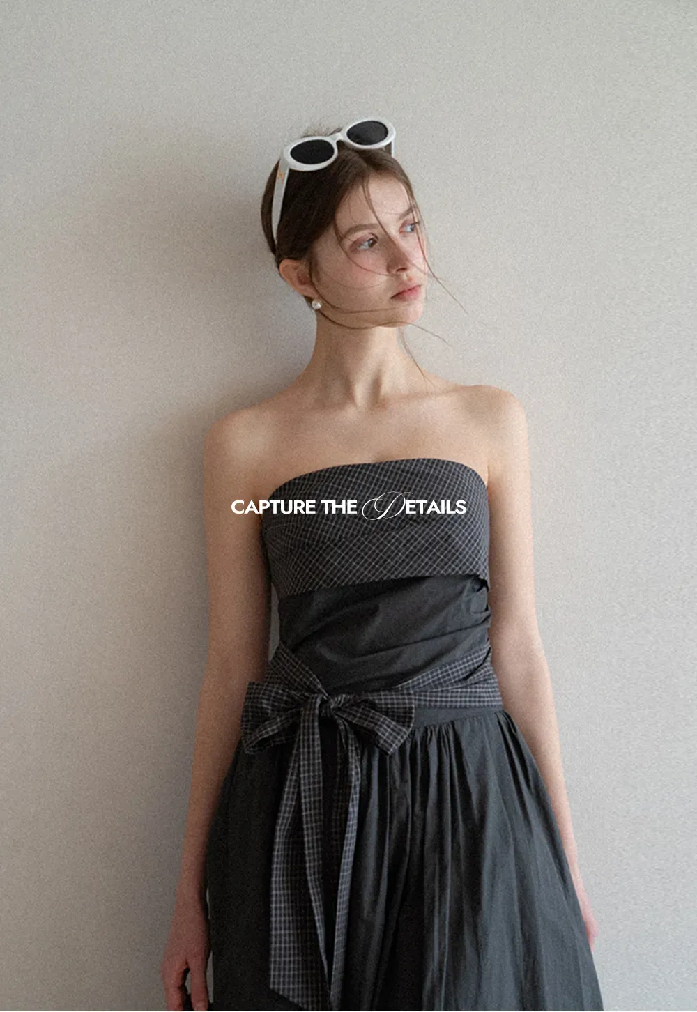 Strapless dress with checkered bodice and tie waist