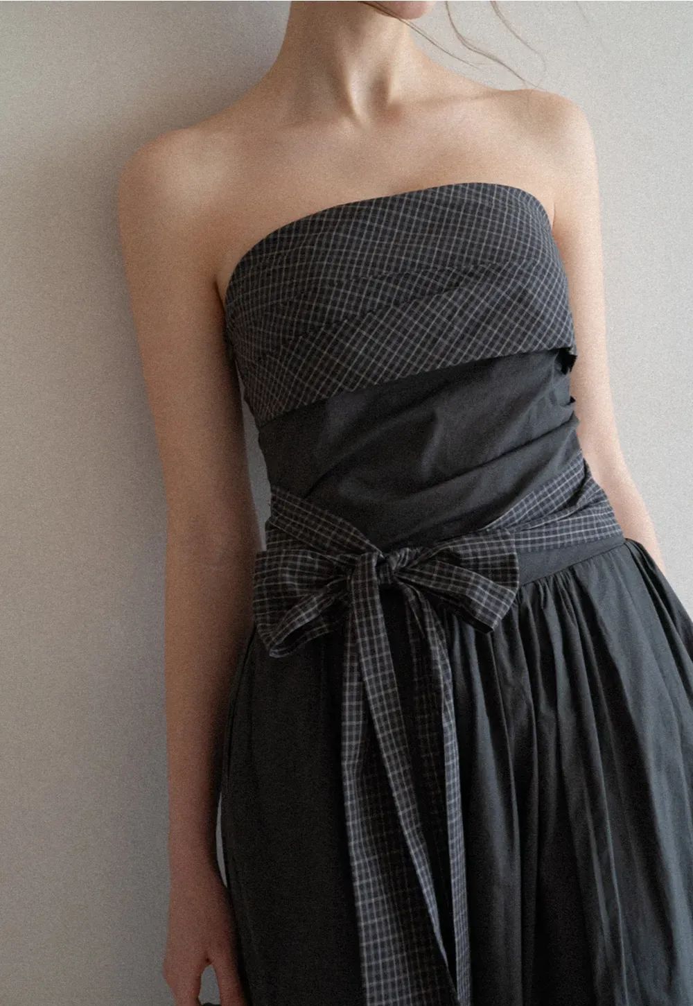 Strapless dress with checkered bodice and tie waist