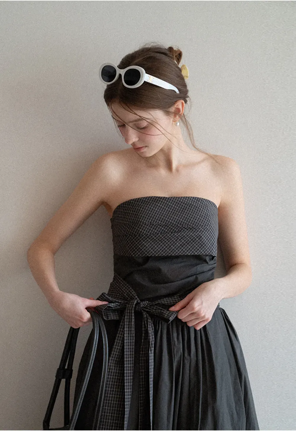 Strapless dress with checkered bodice and tie waist
