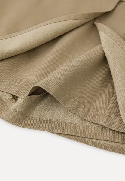 Short skirt with front overlap and belt loops