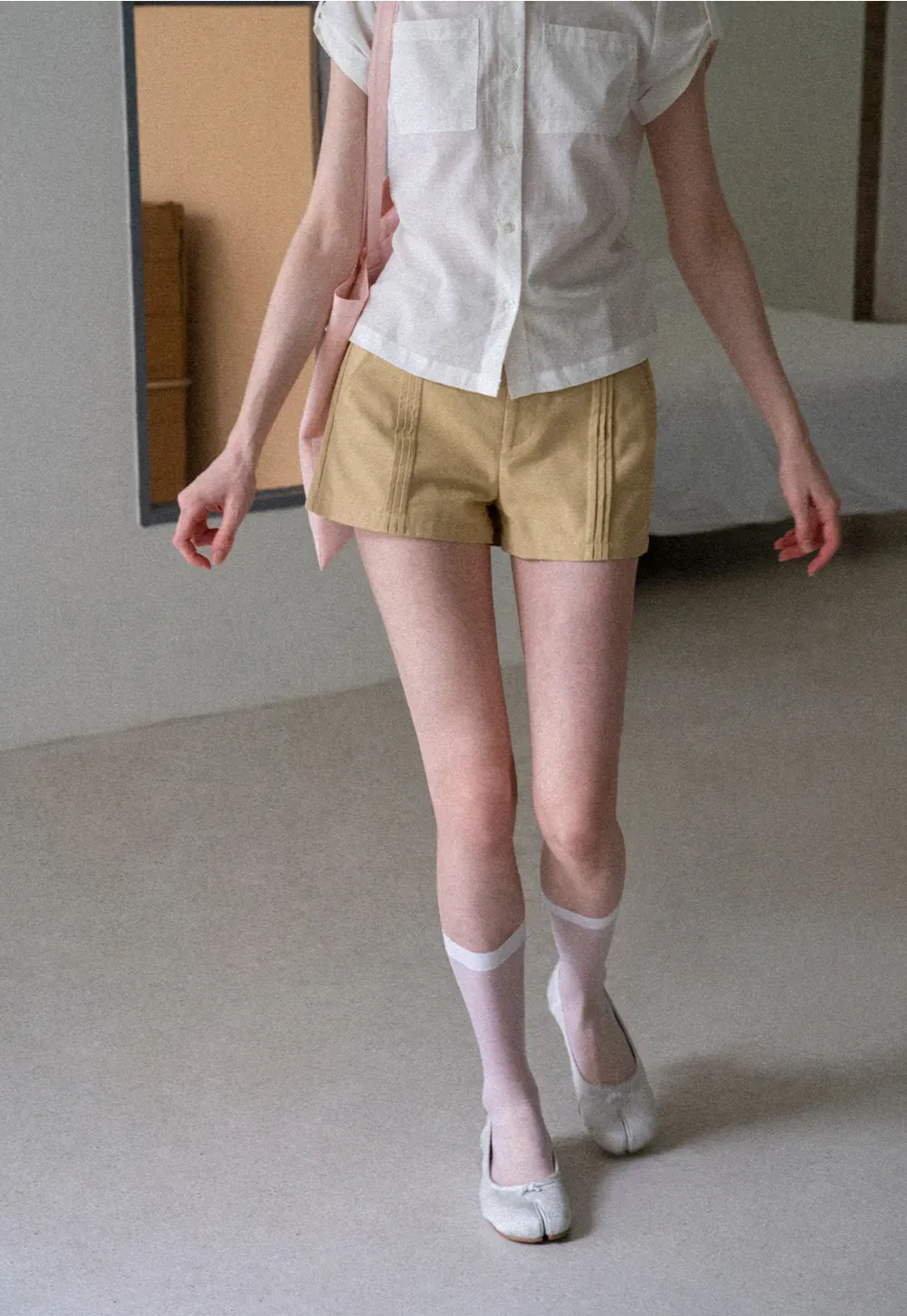 High Waist Pleated Shorts with Button Detailing