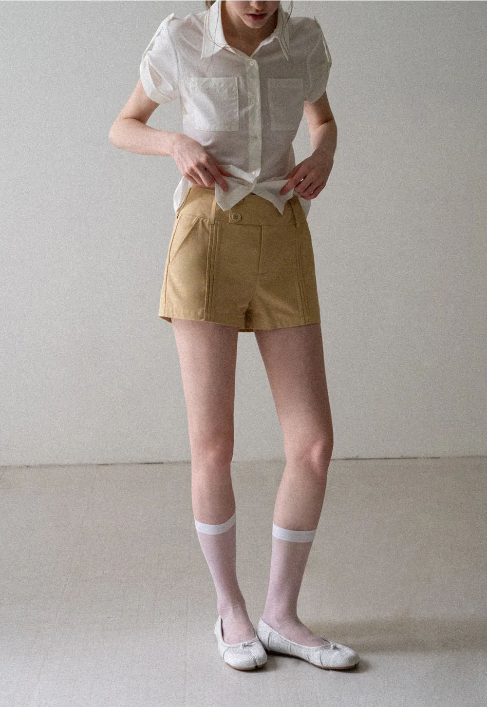 High Waist Pleated Shorts with Button Detailing