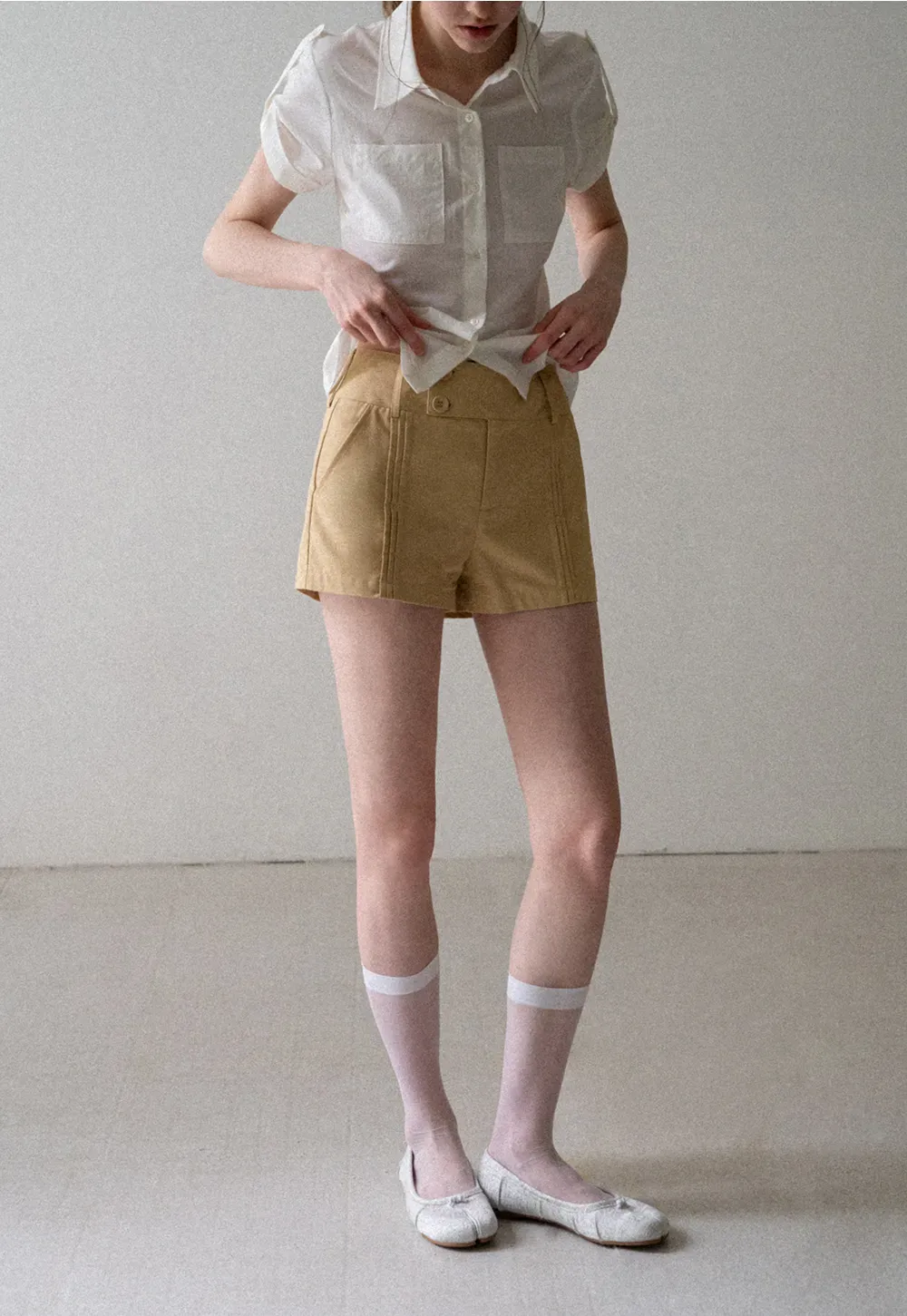 High Waist Pleated Shorts with Button Detailing