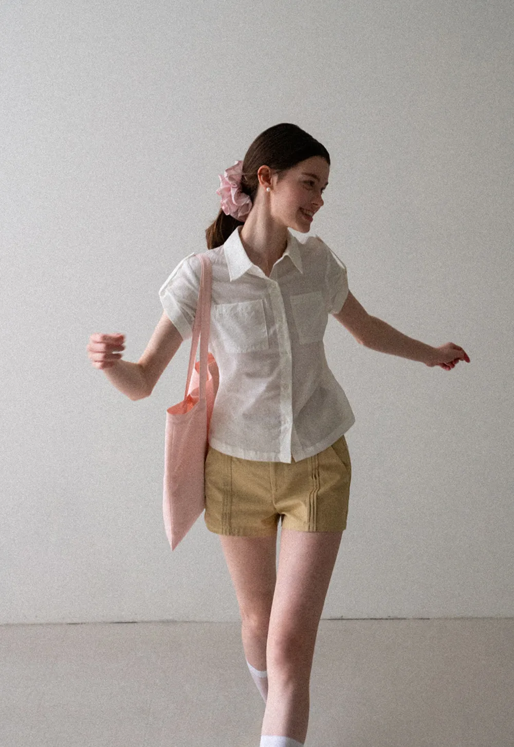 High Waist Pleated Shorts with Button Detailing