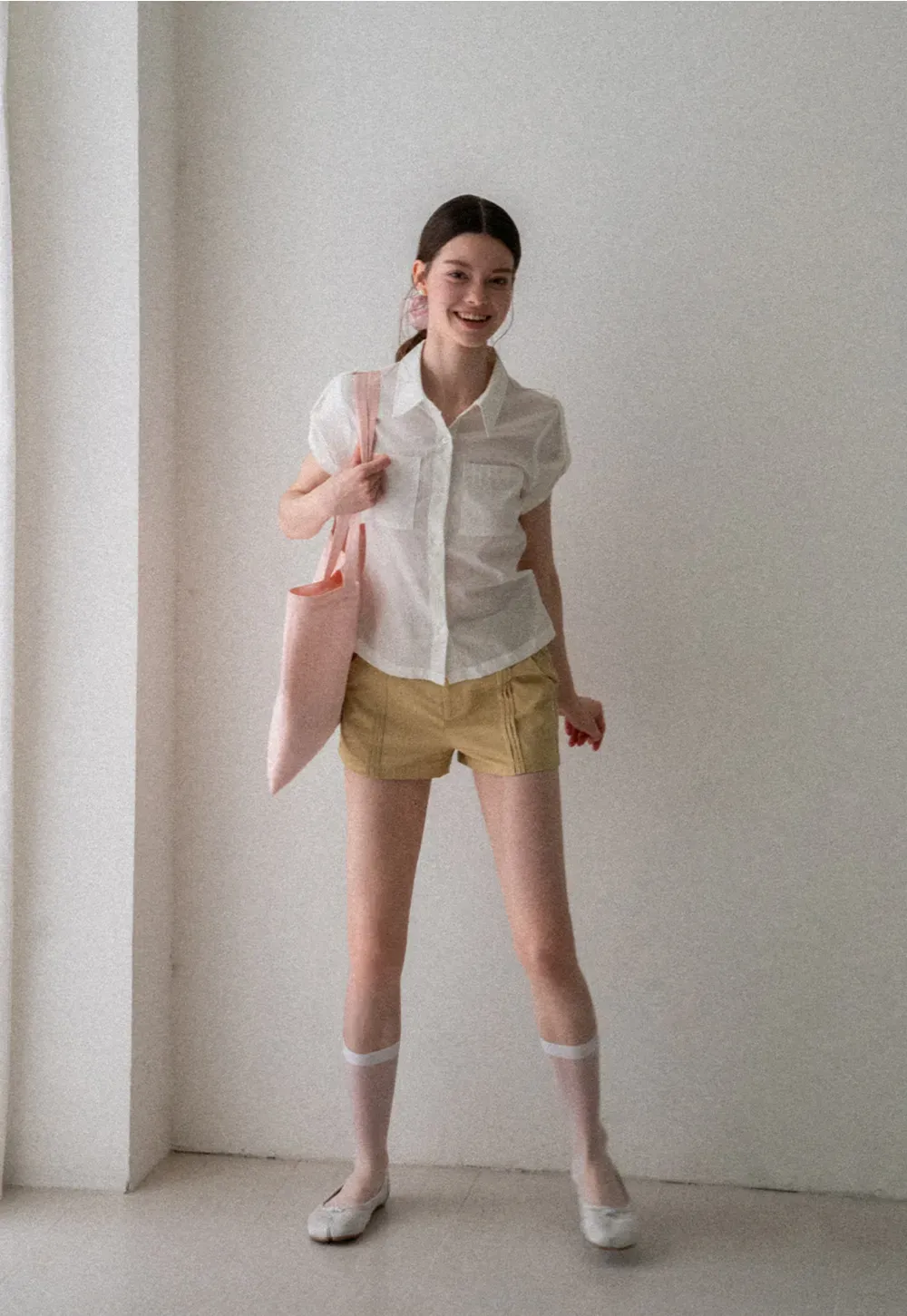 High Waist Pleated Shorts with Button Detailing