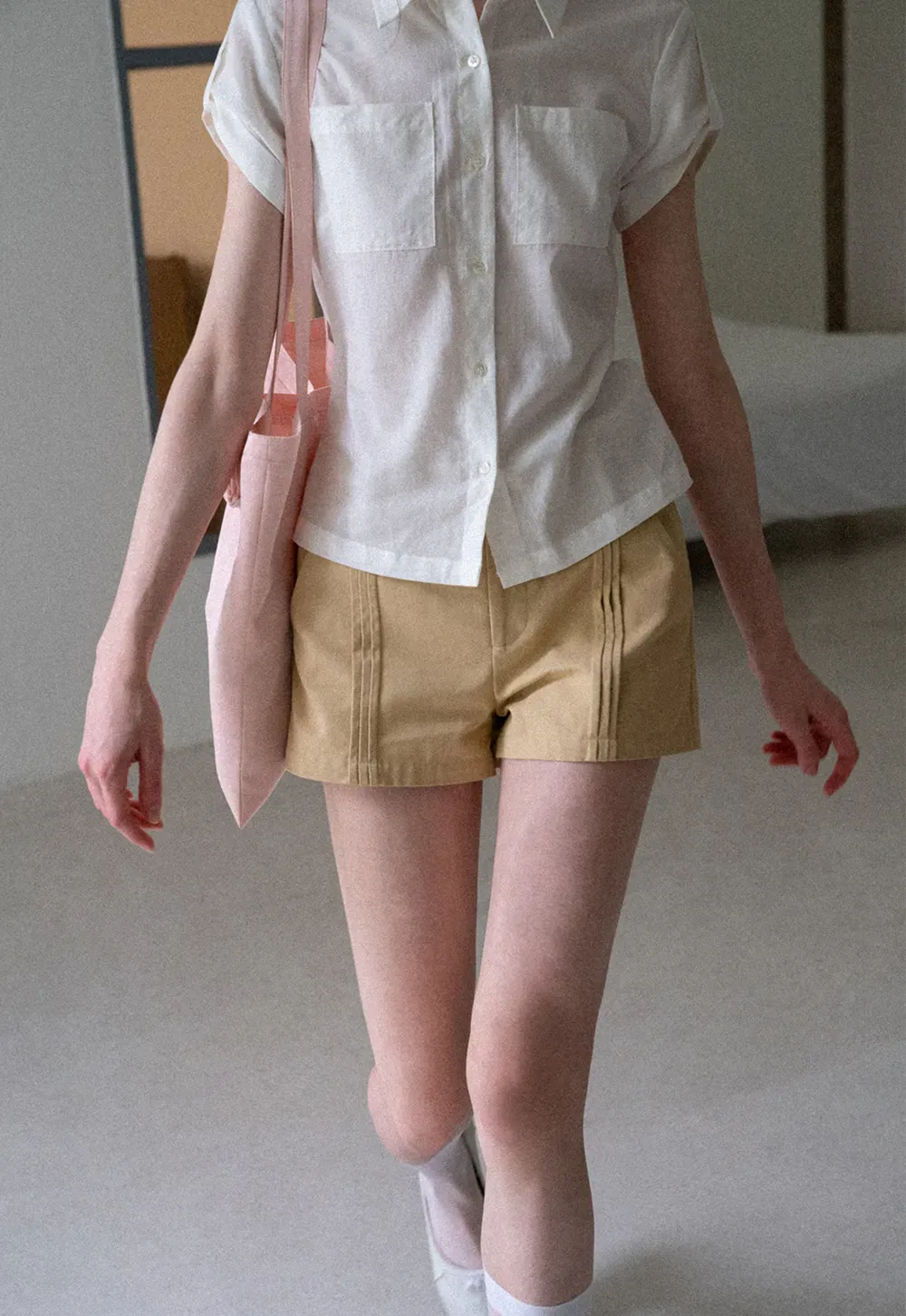 High Waist Pleated Shorts with Button Detailing