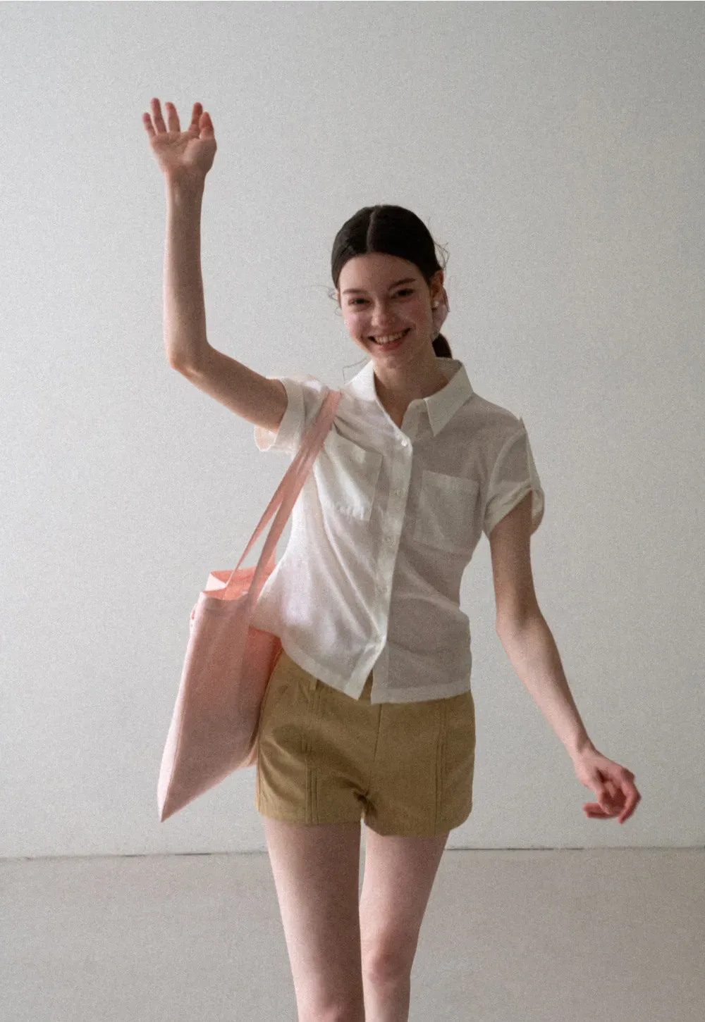 High Waist Pleated Shorts with Button Detailing