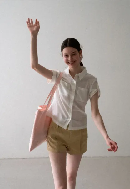 High Waist Pleated Shorts with Button Detailing