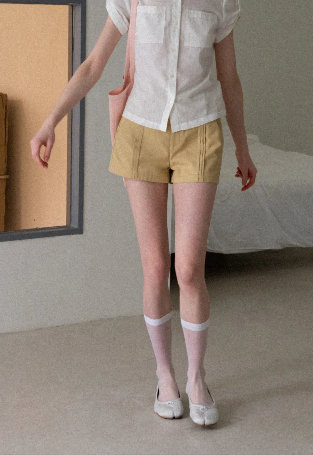 High Waist Pleated Shorts with Button Detailing
