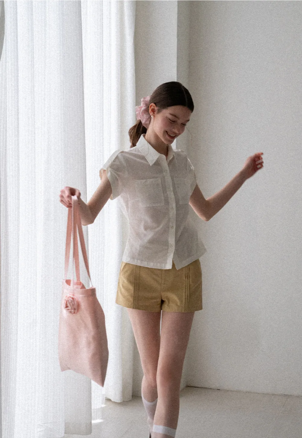 High Waist Pleated Shorts with Button Detailing