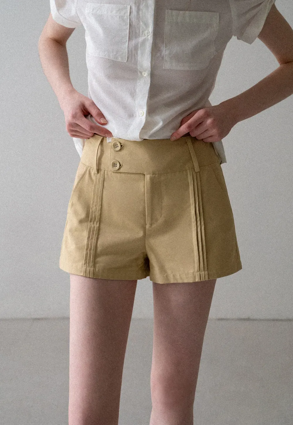 High Waist Pleated Shorts with Button Detailing