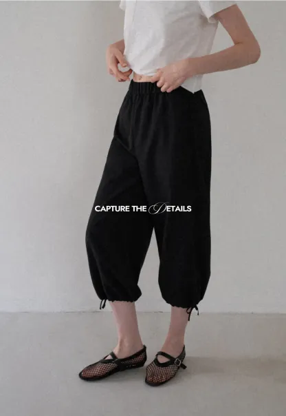 Lässige, lässige Hose mit kurzem, weitem Bein und Kordelzugbund