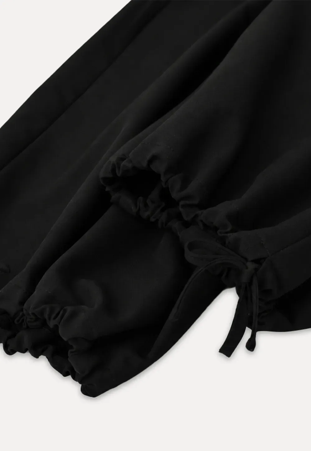 Lässige, lässige Hose mit kurzem, weitem Bein und Kordelzugbund