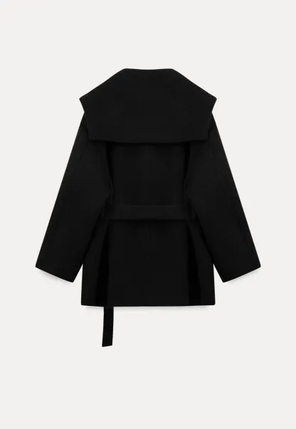 Cozy Black Oversized Coat with Knee-High Boots