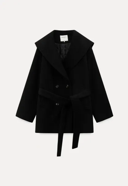 Cozy Black Oversized Coat with Knee-High Boots