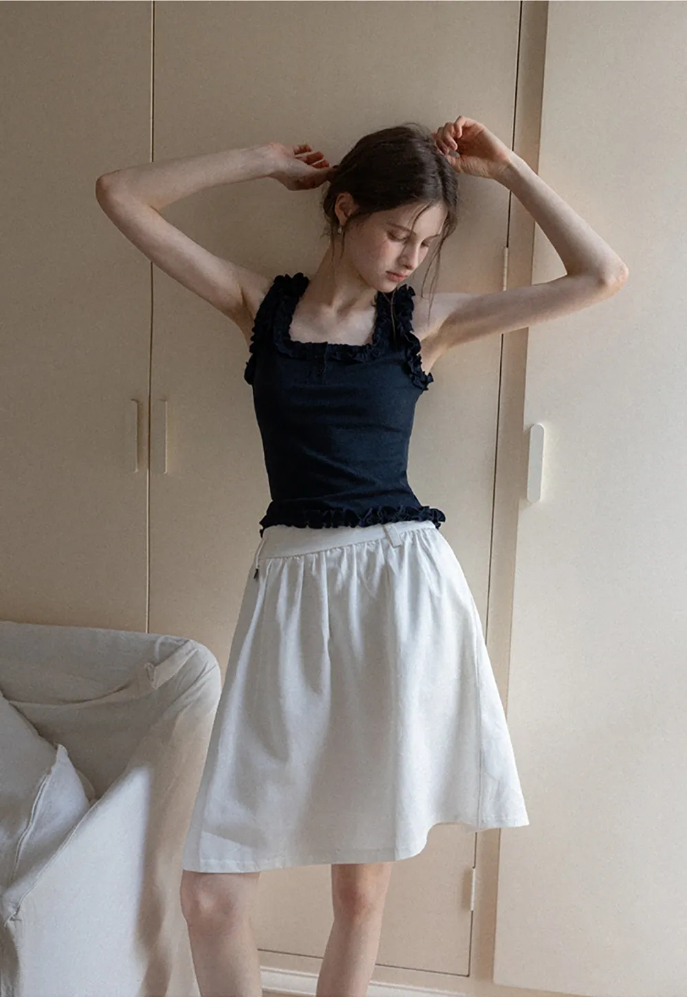 Women's Sleeveless Collared Button Down Knit Top