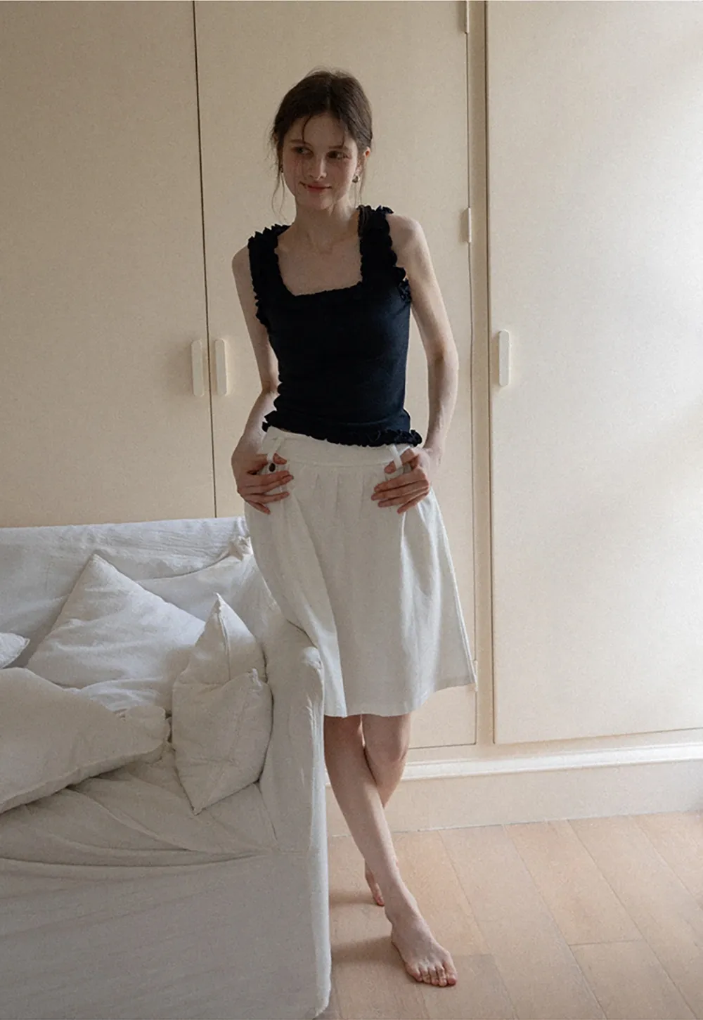 Women's Sleeveless Collared Button Down Knit Top