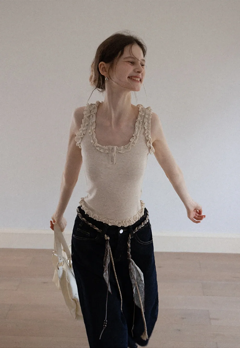 Women's Sleeveless Collared Button Down Knit Top