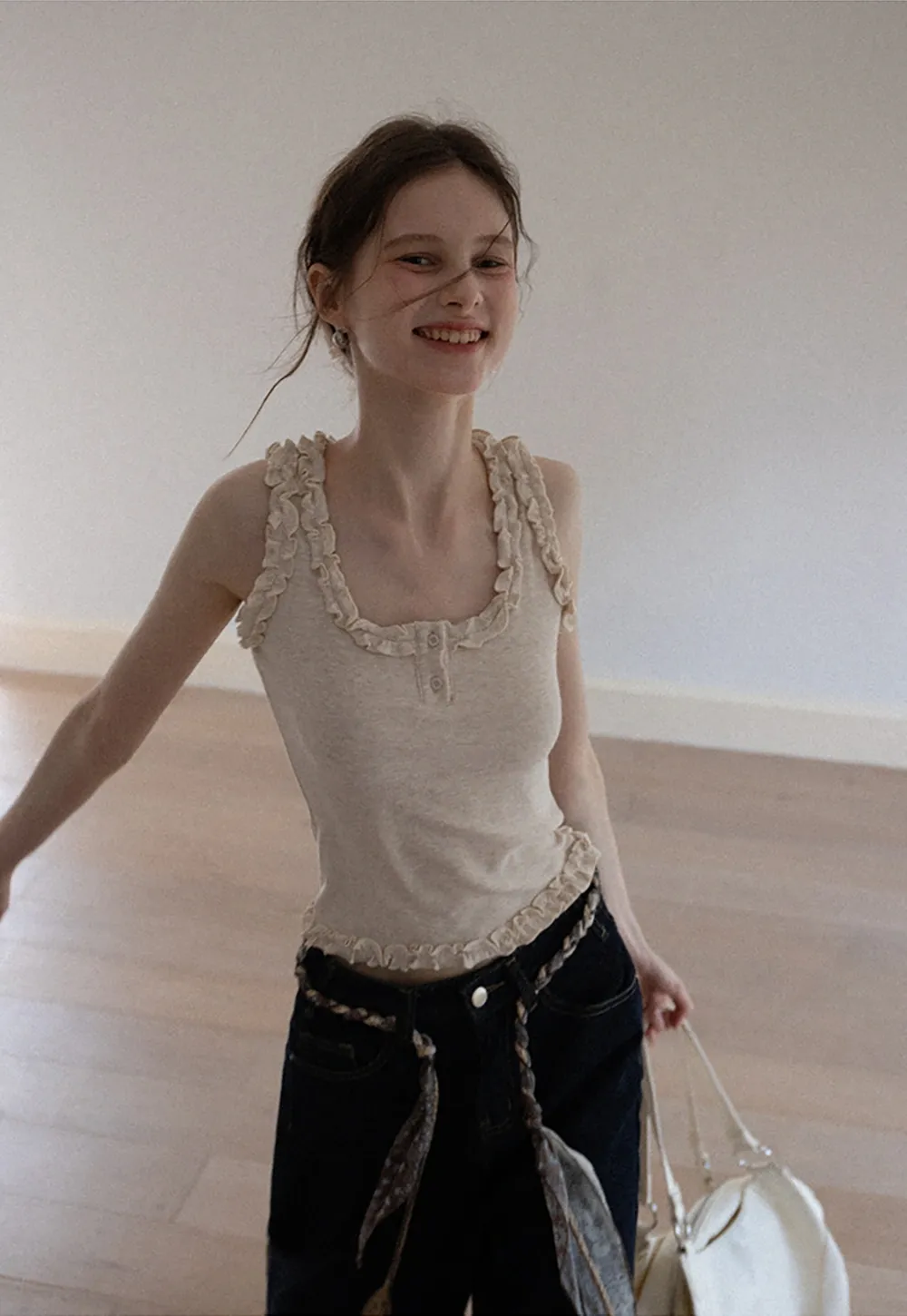 Women's Sleeveless Collared Button Down Knit Top