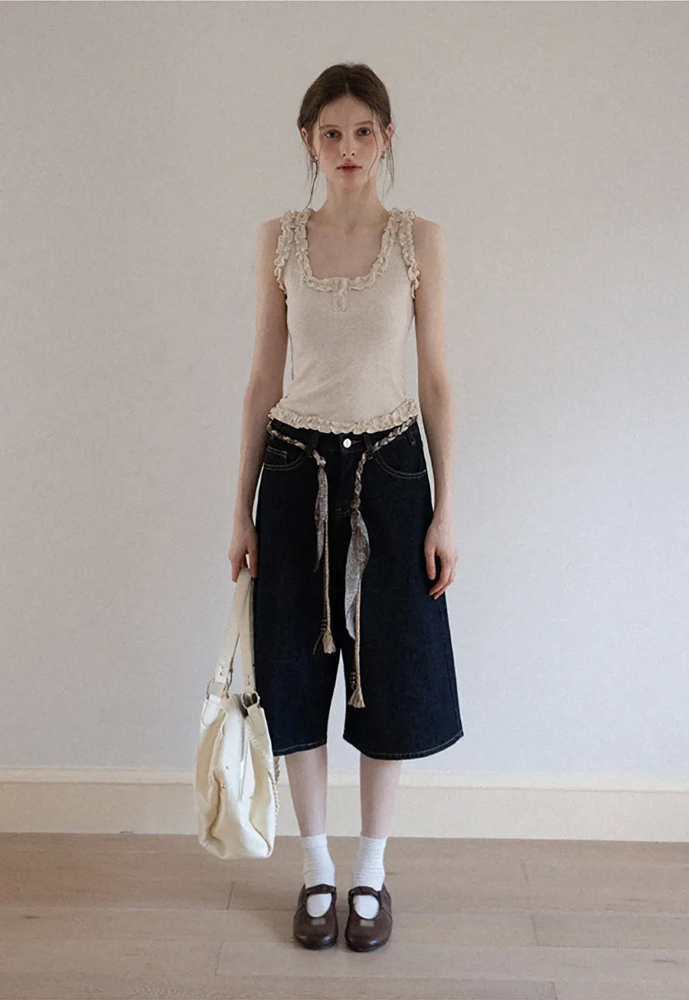 Women's Sleeveless Collared Button Down Knit Top